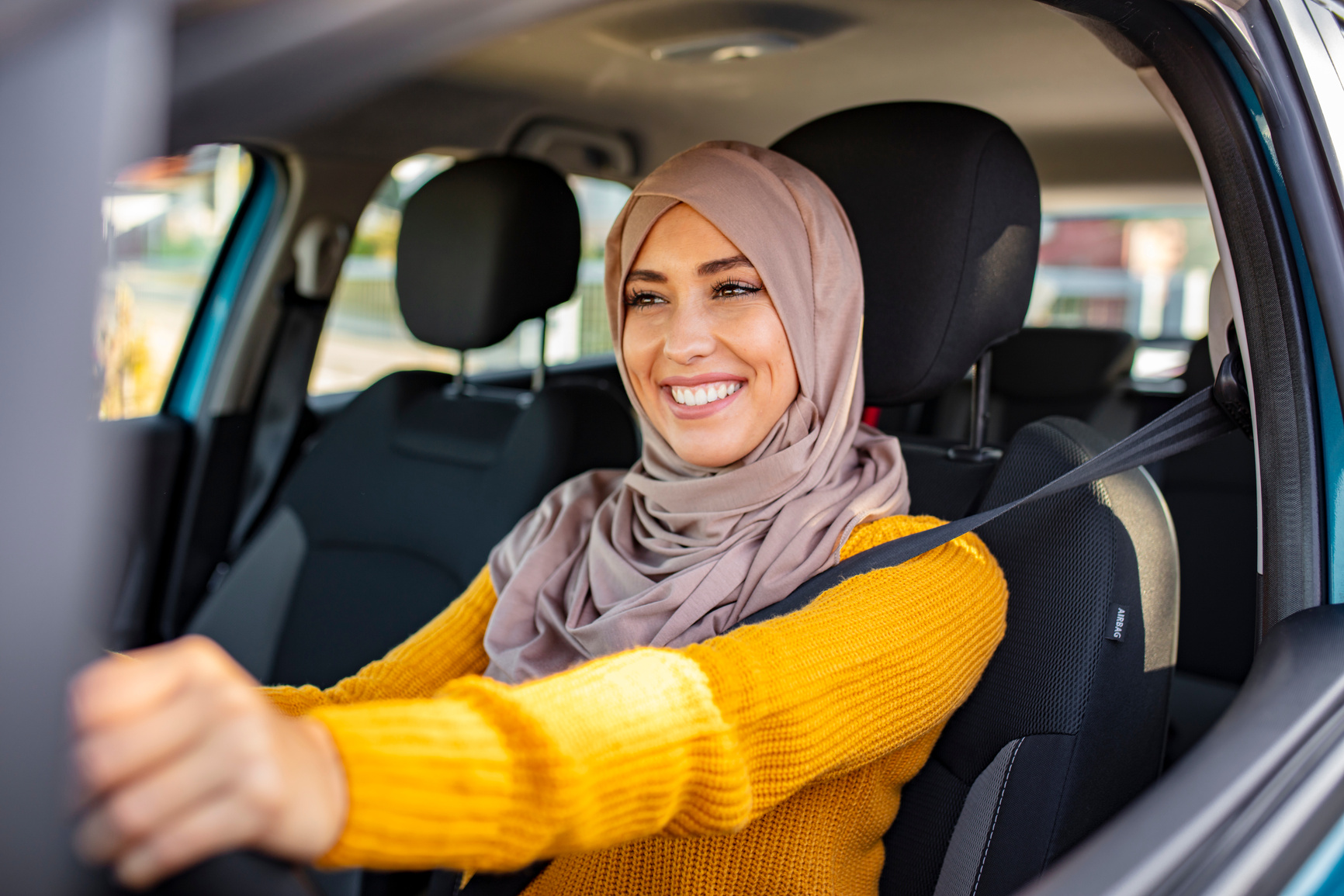 Arab women driving car.
